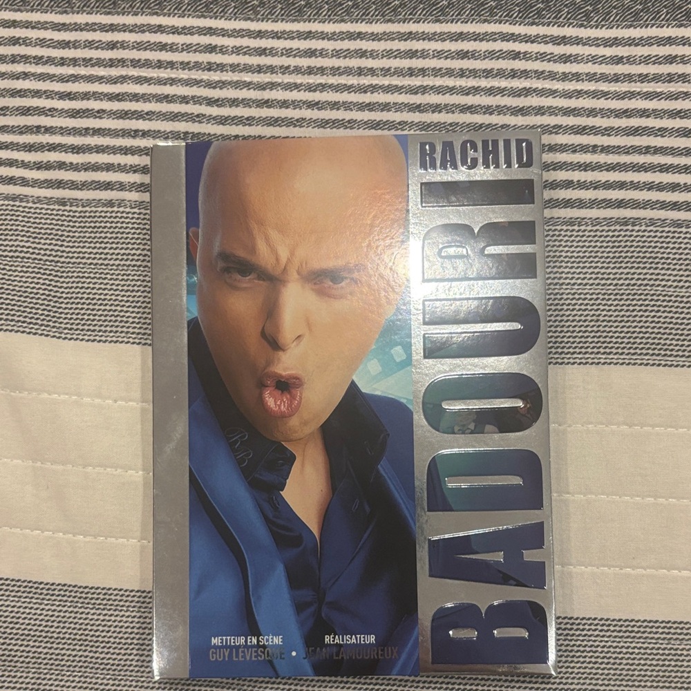 Rachid Badouri DVD with Silver and Blue Cover
